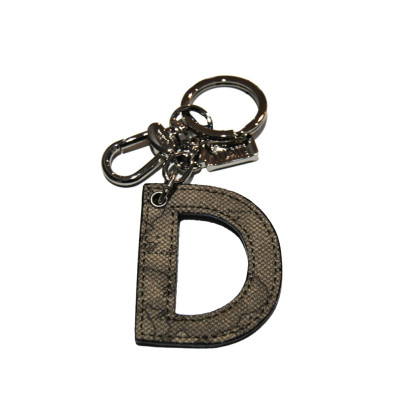 Porta Chiavi Ciondolo Charm Lettera D Alviero Martini 1^ Classe Geo Tortora P00D61300590 | Valigeria.it